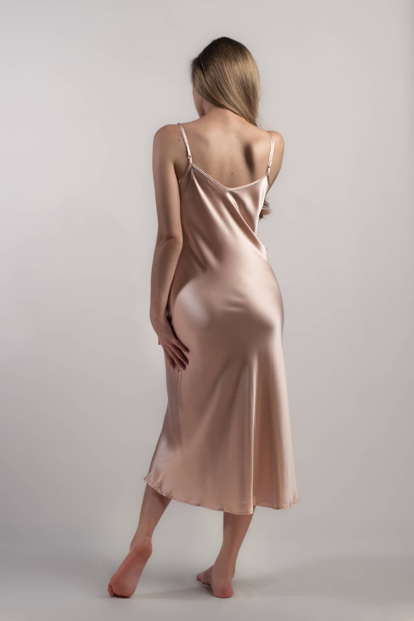 Silk Closet pink silk slip dress. Luxury pure silk with a timeless design. Back view.